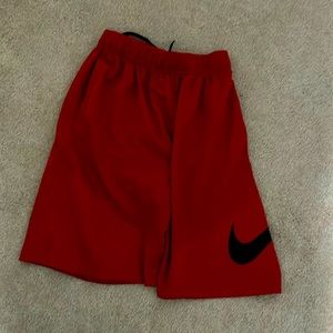 Boys red Nike shorts.  Size small.